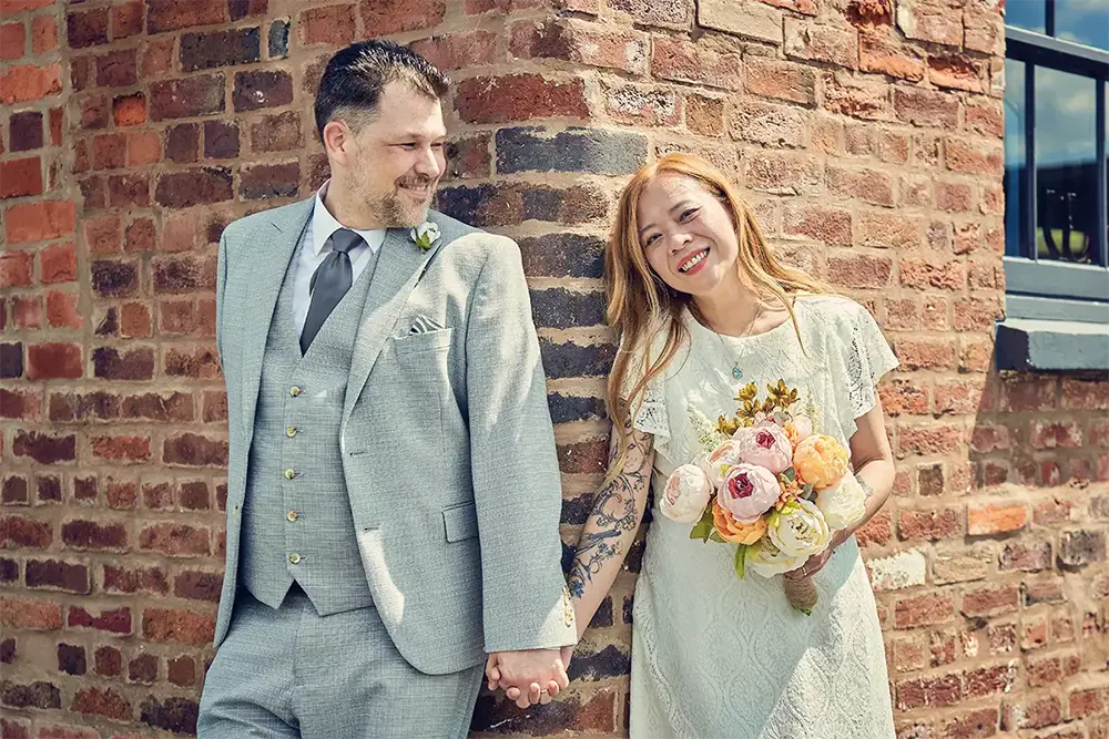 Small micro-wedding with couple and guest, informal registry office setting, Worcestershire Small micro-wedding with couple and guest, informal registry office setting, Worcestershire