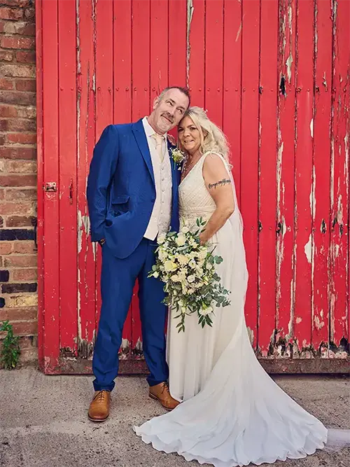 Bride and groom smiling together outside on wedding day, Worcestershire Bride and groom smiling together outside on wedding day, Worcestershire